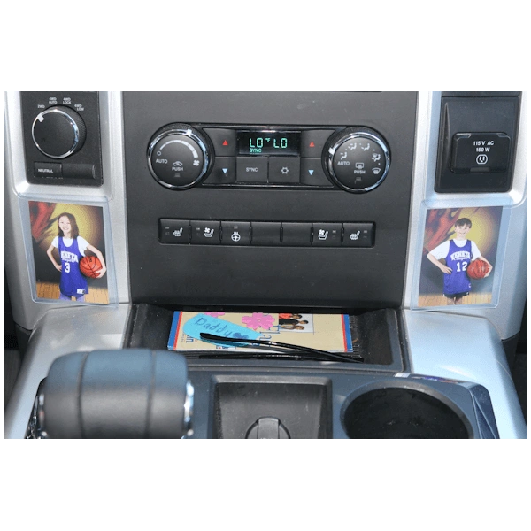 Vehicle console displaying athlete pictures